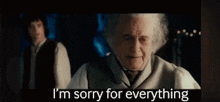 a man in a suit and tie is saying `` i 'm sorry for everything '' while another man looks on .