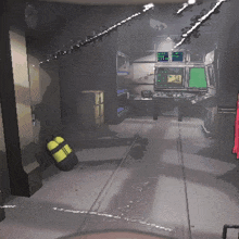 a video game shows a room with a green screen and a yellow bag on the floor