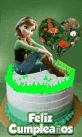 a birthday cake with a girl on top and the words feliz cumpleanos