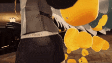 a person wearing calvin klein underwear is standing in front of a yellow balloon