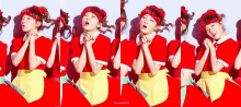 a woman wearing a red apron and a headband is making a funny face