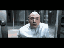 Dr Evil Searching GIF - Dr Evil Searching Looking Around GIFs