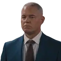 a man in a suit and tie with the words that 's what i want behind him