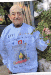 a man wearing a sweater that says it 's holiday