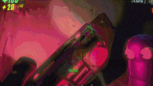 a video game screen shows a purple worm with a glowing eye