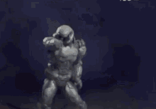 a statue of a man is surrounded by smoke and smoke coming out of it .
