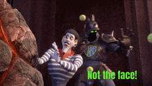 a cartoon of a mime and a robot with the words not the face on the bottom
