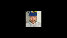 a man wearing a blue hat with the word kobe on the top