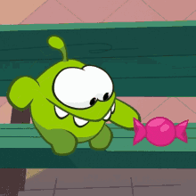 Unwrap The Candy Om Nom GIF - Unwrap The Candy Om Nom Om Nom And Cut The Rope GIFs