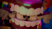 a close up of a cartoon mouth with teeth