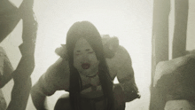 a woman with long hair and red lips is kneeling down