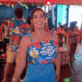a woman wearing a shirt that says são jorge on it