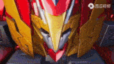 a close up of a robot 's head with a bird 's head on it .