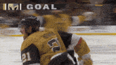 a hockey player with the number 21 on his jersey is on the ice