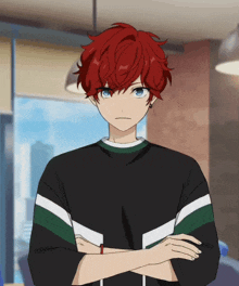 a boy with red hair and blue eyes stands with his arms crossed in front of a window
