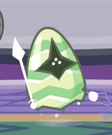 a cartoon drawing of a green egg with a star on it