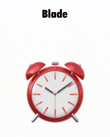 a red alarm clock with the word blade written above it