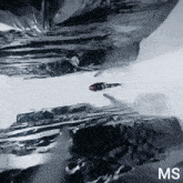 a picture of a person flying through the air with the letters ms below it