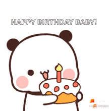a panda bear is holding a birthday cake with a candle in its mouth .