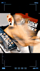 a blurry picture of a person wearing a shirt that says president dunk