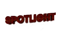 a red sign that says spotlight on it