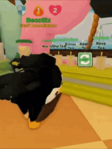 a penguin in a video game with the number 2 on the top