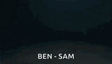 a close up of a robot 's arm with the words ben - sam written on it .