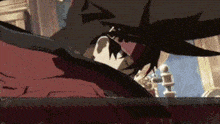 a close up of a cartoon character 's face with a sword .
