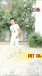 a man in a white shirt is dancing in front of a sign that says fay