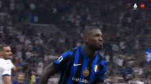 a soccer player wearing a jersey that says ' betsson ' on it