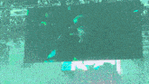 a large screen shows a woman drinking from a bottle of coke