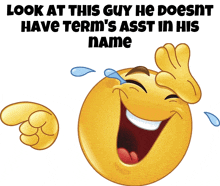 a smiley face is laughing with tears coming out of his eyes and the caption says look at this guy he doesnt