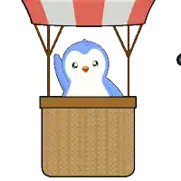 a penguin is sitting in a hot air balloon