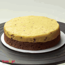 a cake that has the word yum up on the bottom right