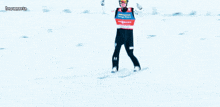 a skier wearing a vest that says ' hormann ' on it
