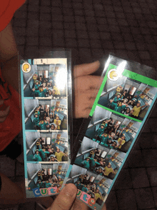 a person is holding two photo strips with the word cute on them