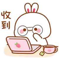 a cartoon rabbit is sitting at a table using a laptop