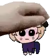 a hand is holding a cartoon character 's head in a pixel art style .