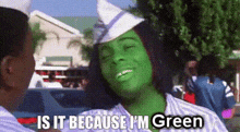 a man with a green mask on his face is talking to another man .