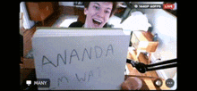 a video of a man holding a sign that says " amanda my way "