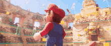 a cartoon character named mario is standing in a stadium with a crowd watching him .
