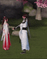 a man and a woman are standing next to each other in a game