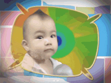 a picture of a baby with the letters aa on the bottom right corner