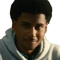 a close up of a man 's face with a white hoodie on