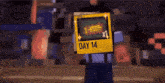 a cartoon character holding a ticket that says day 14