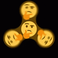 a spinning fidget spinner with a thinking face on it