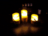 a sign that says " i missed u so much " next to three candles