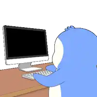 a blue penguin is typing on a keyboard in front of a computer screen
