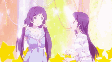 two anime girls are standing next to each other