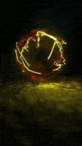 a glowing circle with a smiley face on it is on a dark background .